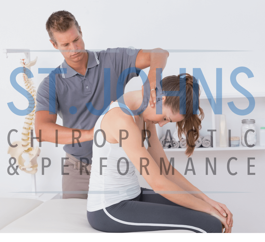Man providing physical therapy for woman