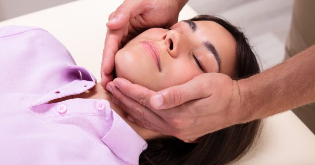 Woman Getting A Massage To Help Relieve Jaw Pain | Jaw Pain Treatment | St. Johns Chiropractic & Performance